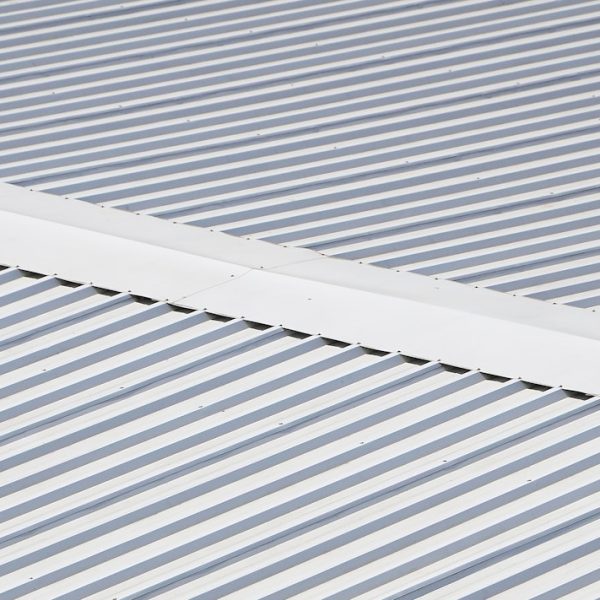 Metal gray roof with rhythmic parallel relief directions